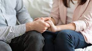 Psychotherapy and Support – Inner Growth Pathways, Horsham Two people holding hands in support, representing compassionate psychotherapy for anxiety, depression, trauma and relationship difficulties